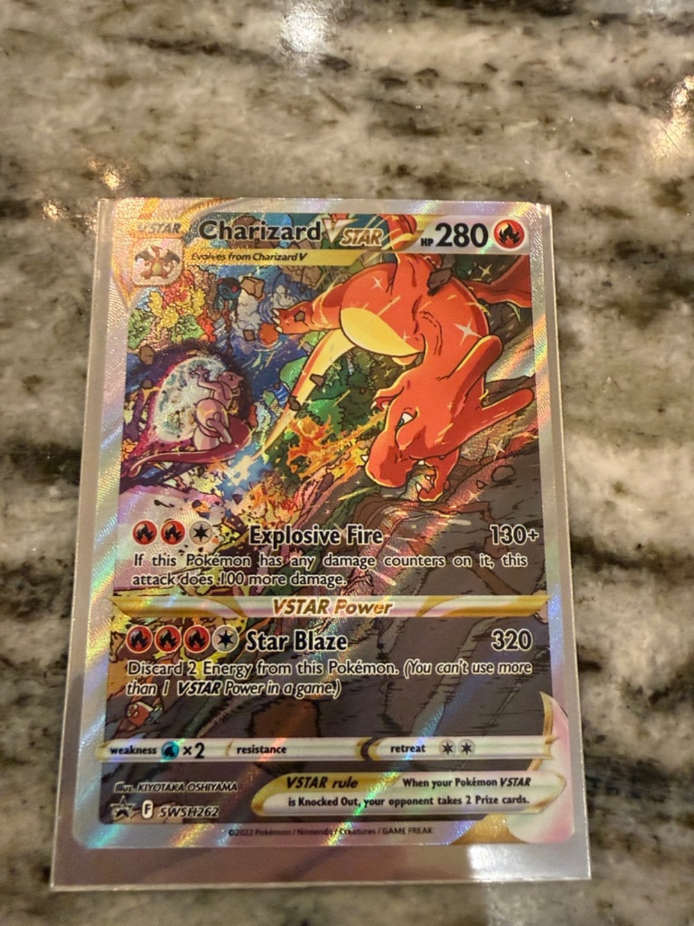 Pokemon Charizard VSTAR Holographic Card - Red & Orange